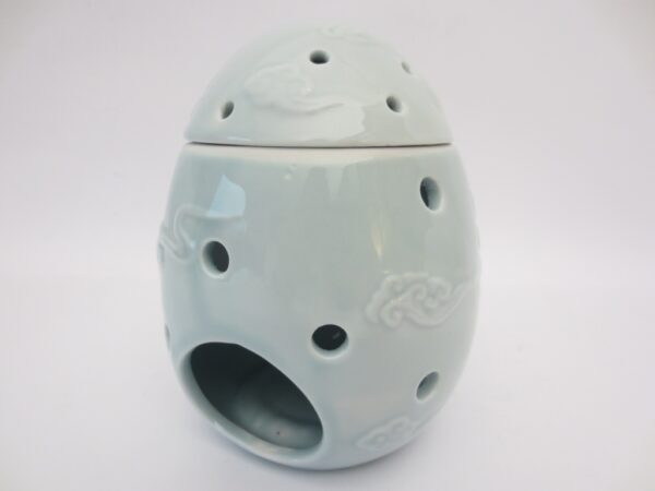 Light blue Buddha head egg oilburner luxury