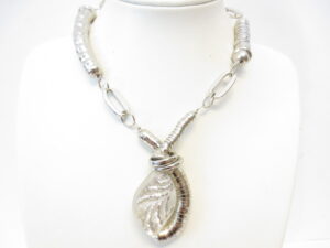 metal necklace with leaf