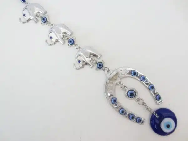 Blue evil eye hanger with 3 elephants