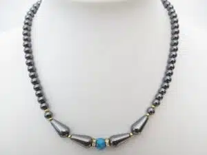 neckalce with one blue bead